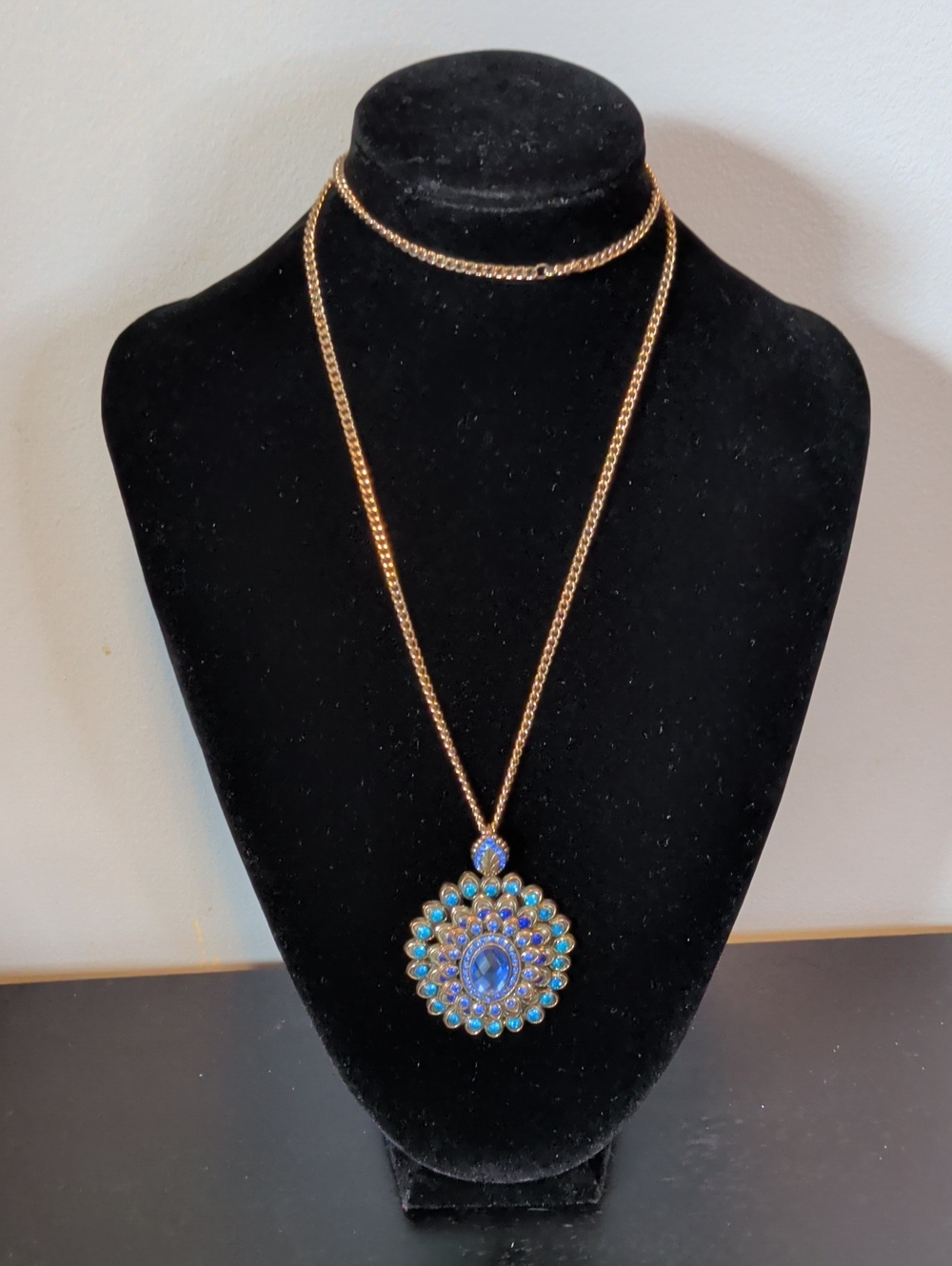 Gold-Tone Necklace with Blue Crystal Pendant